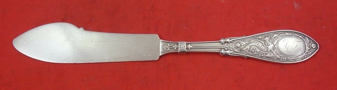 Whiting Arabesque Sterling Silver Master Butter Knife 7 1/4": Whiting Arabesque Sterling Silver Master Butter Knife 7 1/4" This exquisite master butter knife features a flat handle and is crafted from high-quality sterling silver. Produced by Whiting in the eleg