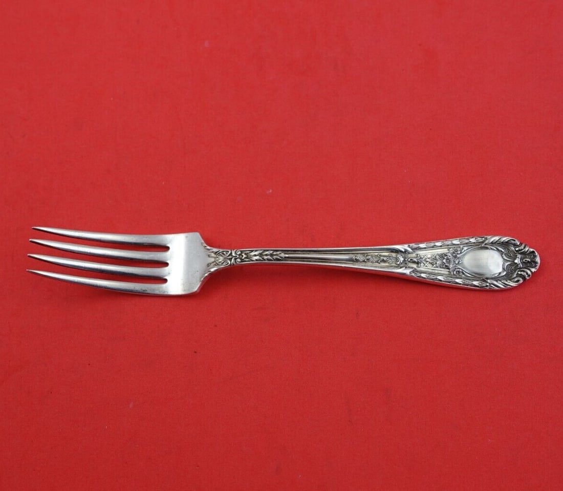 International Sterling Silver Fontaine Junior Fork 6.25 Inches: International Sterling Silver Fontaine Junior Fork 6.25 Inches This exquisite Junior Fork, measuring 6 1/4 inches, belongs to the Fontaine pattern by International Sterling. Crafted from high-quality