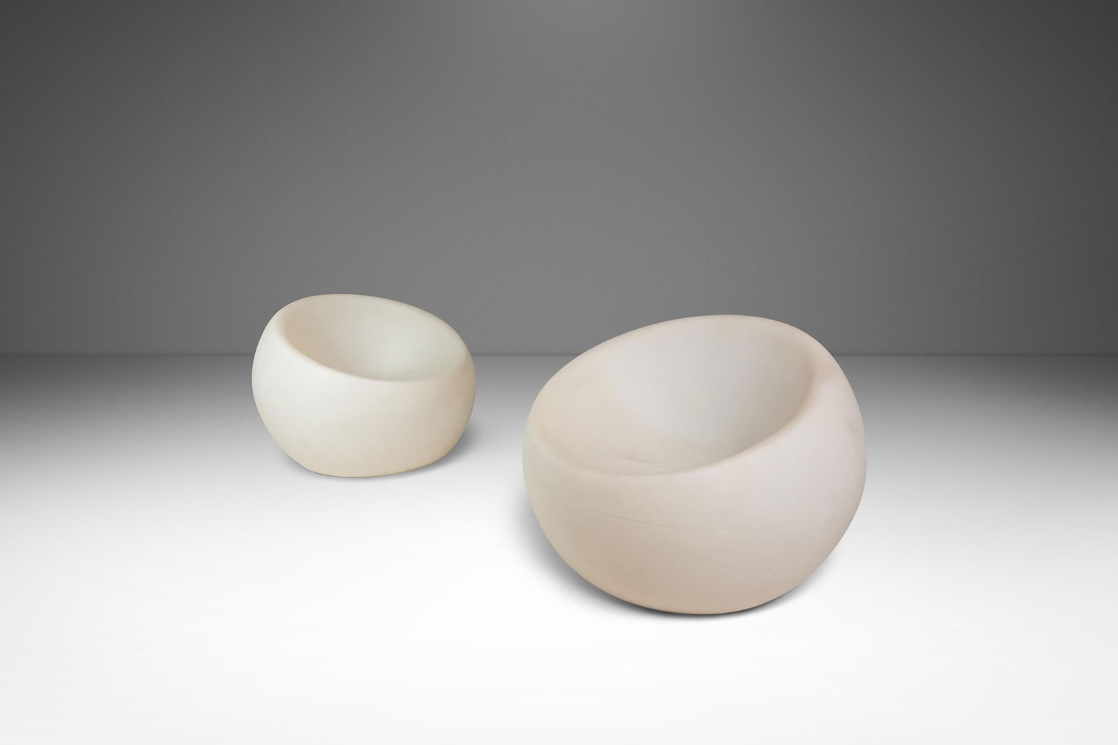 Souluxe Set of 2 Mid-Century Lighted Spherical Egg Chairs USA 2000s: Souluxe Set of 2 Mid-Century Lighted Spherical Egg Chairs USA 2000s This stunning set of two Mid-Century Post Modern lighted accent egg chairs showcases a unique spherical design, ideal for both outdo