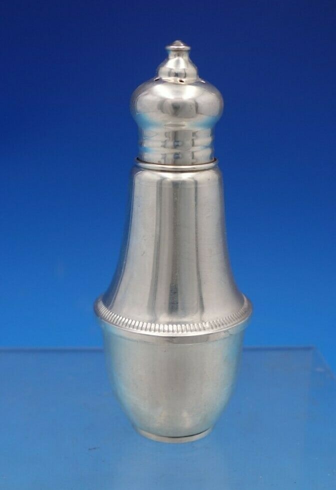 Duchin Creations Sterling Silver Pepper Shaker with Glass Liner 4 1/4in: Duchin Creations Sterling Silver Pepper Shaker with Glass Liner 4 1/4in This exquisite pepper shaker from Duchin Creations showcases a beautiful composition of sterling silver, complemented by a glass