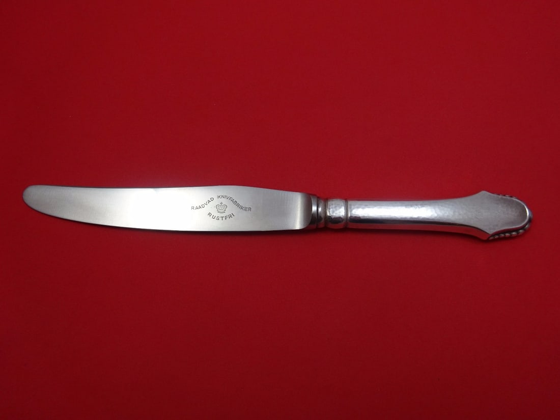 Grann & Laglye Christiansborg Sterling Silver Dinner Knife 9 3/4": Grann & Laglye Christiansborg Sterling Silver Dinner Knife 9 3/4" Introducing the Christiansborg dinner knife by Grann & Laglye, a stunning piece of Danish craftsmanship. This 9 3/4" knife features a