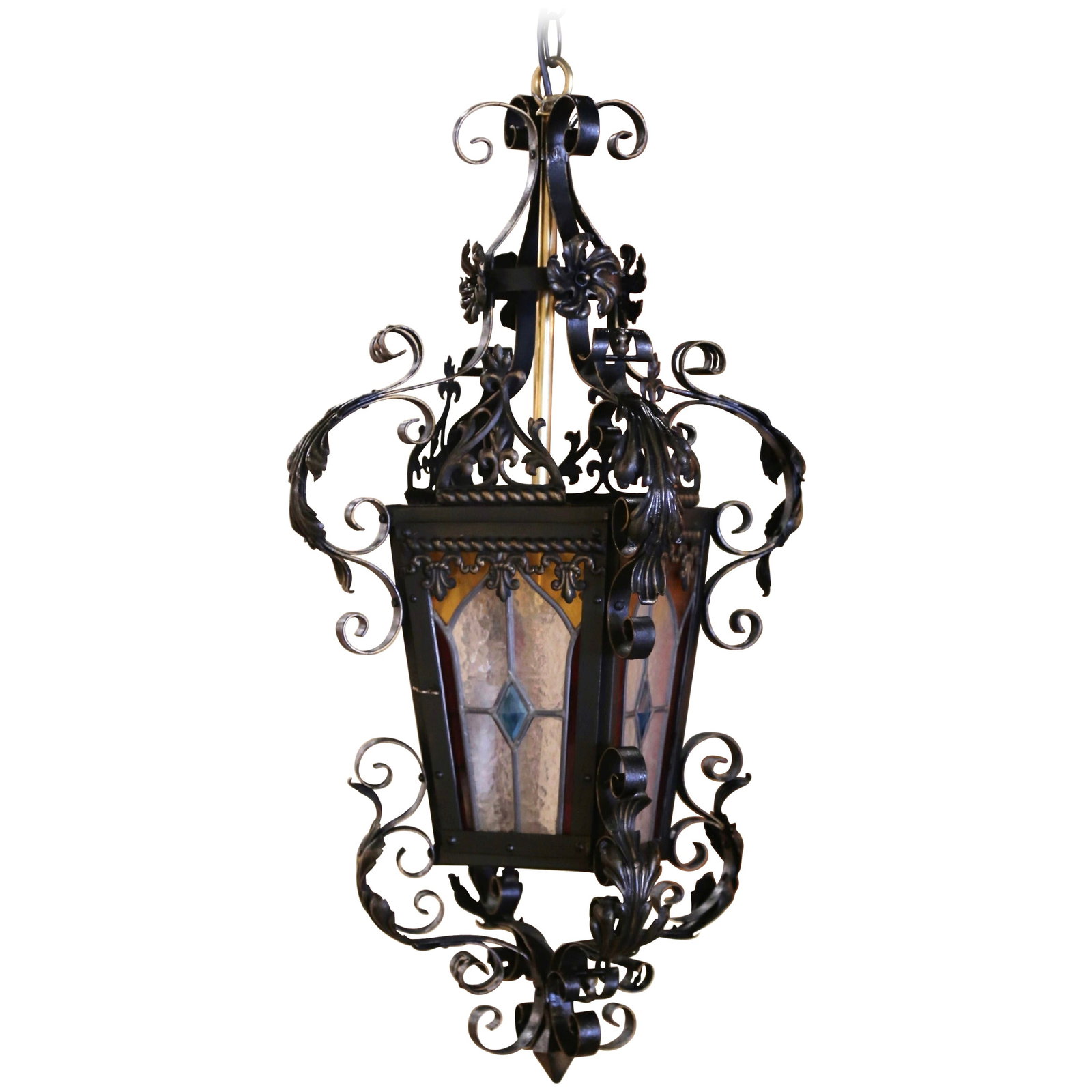Antique Napoleon III Iron Lantern with Stained Glass Panels: Antique Napoleon III Iron Lantern with Stained Glass Panels Illuminate your space with this exquisite 19th Century French Napoleon III Iron Lantern, a stunning example of Gothic style craftsmanship. D
