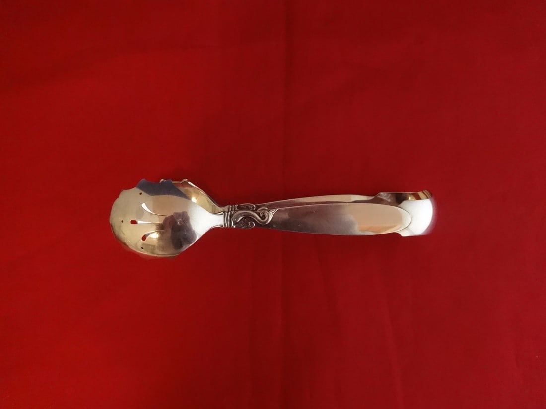 Frigast Dolphin Sterling Silver Ice Tong 7.25 Inch Serving Utensil: Frigast Dolphin Sterling Silver Ice Tong 7.25 Inch Serving Utensil Introducing the Dolphin Ice Tong by Frigast, a stunning serving piece crafted from high-quality sterling silver. Measuring 7 1/4 inch