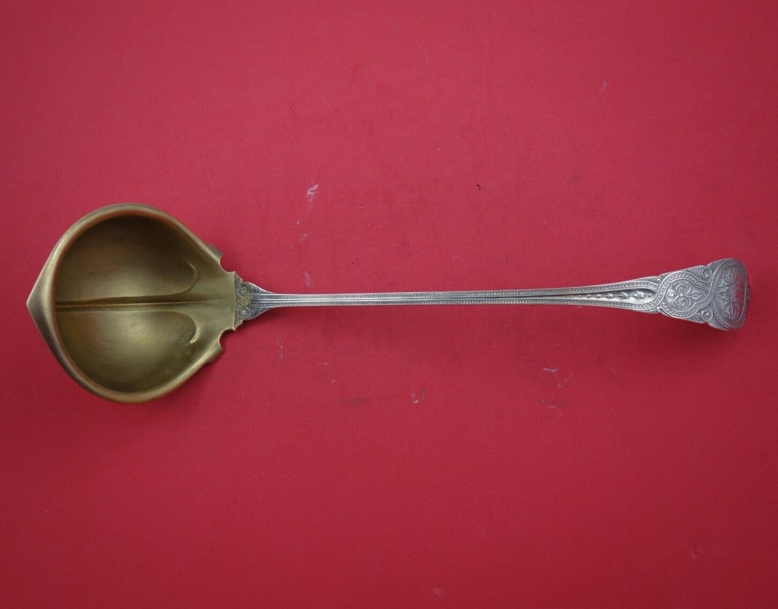 Wendt Moresque Sterling Silver Soup Ladle Gold Washed 13.5" Monogrammed: Wendt Moresque Sterling Silver Soup Ladle Gold Washed 13.5" Monogrammed Discover the elegance of the Moresque soup ladle by Wendt, crafted from high-quality sterling silver. This exquisite piece dates