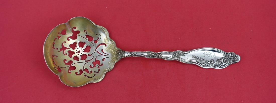 International Sterling Silver Mille Fleurs Pea Spoon Gold Wash 8 1/4": International Sterling Silver Mille Fleurs Pea Spoon Gold Wash 8 1/4" Discover this exquisite Mille Fleurs pea spoon crafted by International, showcasing a delicate floral pattern. Made from high-qual