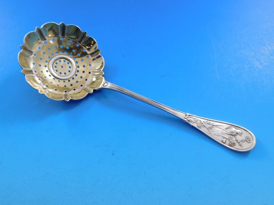 Tiffany & Co Japanese Sterling Silver Sugar Sifter Gold Wash Flower 5 5/8": Tiffany & Co Japanese Sterling Silver Sugar Sifter Gold Wash Flower 5 5/8" This exquisite sugar sifter from Tiffany & Co. showcases the elegance of the Japanese pattern, crafted from high-quality ster