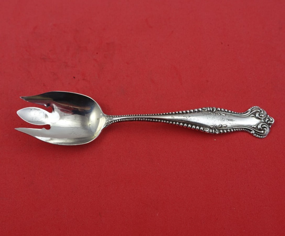 Towle Canterbury Sterling Silver Ice Cream Fork 5 3/8" Monogrammed: Towle Canterbury Sterling Silver Ice Cream Fork 5 3/8" Monogrammed Indulge in the elegance of the Canterbury ice cream fork, crafted by Towle. This exquisite piece is made from sterling silver and fea