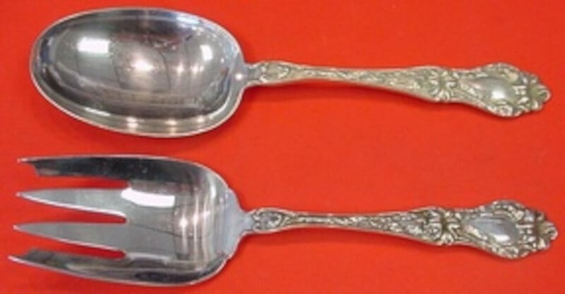 Frank Whiting Sterling Silver 2pc Salad Serving Set Lily Pattern 9": Frank Whiting Sterling Silver 2pc Salad Serving Set Lily Pattern 9" This exquisite 2-piece salad serving set is crafted from fine sterling silver by Frank Whiting, featuring the elegant 'Lily' pattern