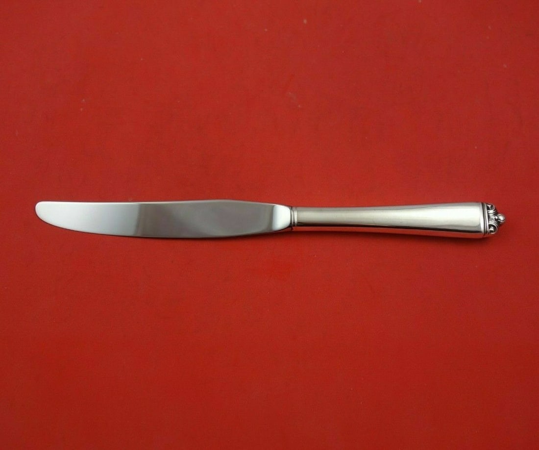 Oneida Reigning Beauty Sterling Silver Knife 8 7/8 Inch Flatware: Oneida Reigning Beauty Sterling Silver Knife 8 7/8 Inch Flatware Introducing the Reigning Beauty Knife from Oneida, a stunning piece of modern flatware crafted with a sterling silver hollow handle and