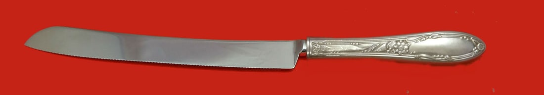 Oneida Virginian Sterling Silver Custom Wedding Cake Knife 12": Oneida Virginian Sterling Silver Custom Wedding Cake Knife 12" This exquisite Virginian wedding cake knife by Oneida features a stunning sterling silver hollow handle complemented by a durable stainle