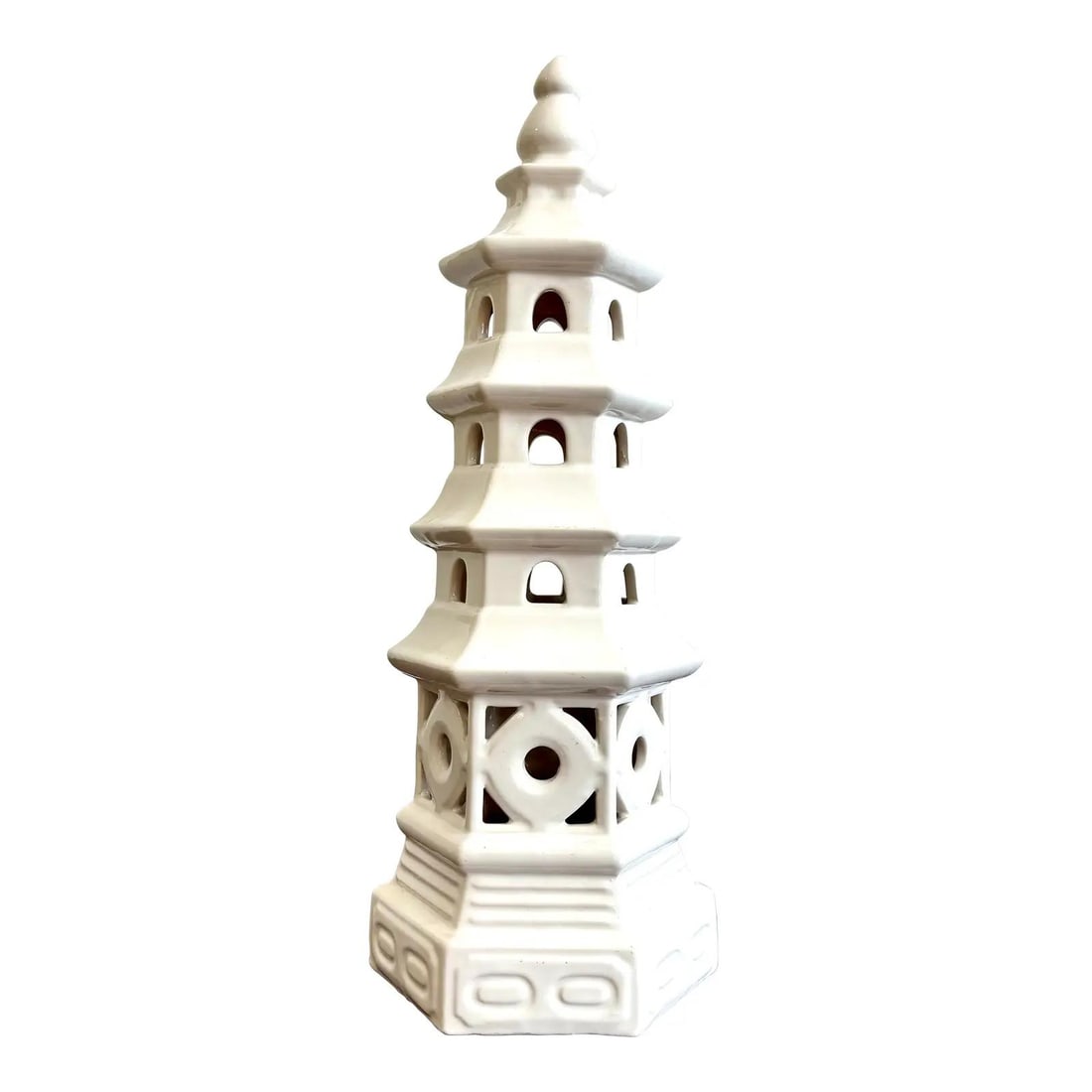 Vintage White Ceramic Pagoda Sculpture Boho Design 18.5": Vintage White Ceramic Pagoda Sculpture Boho Design 18.5" This vintage Boho glazed ceramic sculpture features a white finish and draws inspiration from traditional East Asian design. Its tiered levels,