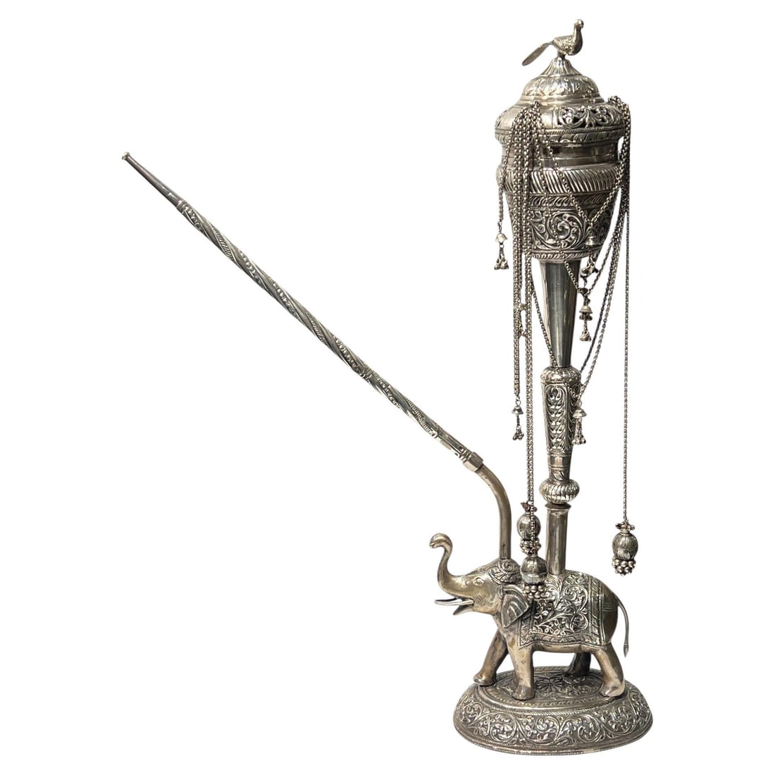 Anglo-Indian Silver Hookah with Elephant Motif Late 19th Century India: Anglo-Indian Silver Hookah with Elephant Motif Late 19th Century India This late 19th century Anglo-Indian hookah (huqqa) is crafted from silver using the repousse technique. The piece features a fine