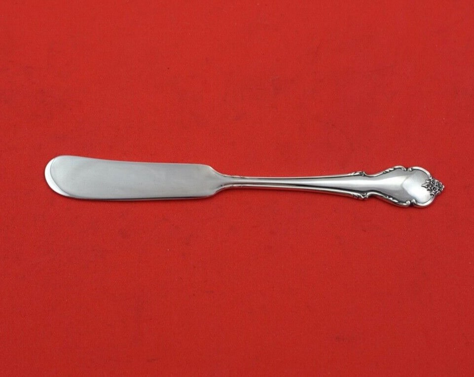 International Sterling Silver Butter Spreader Breton Rose 5 3/4 Inch: International Sterling Silver Butter Spreader Breton Rose 5 3/4 Inch This exquisite butter spreader features the elegant Breton Rose pattern by International Sterling. Crafted from high-quality sterli