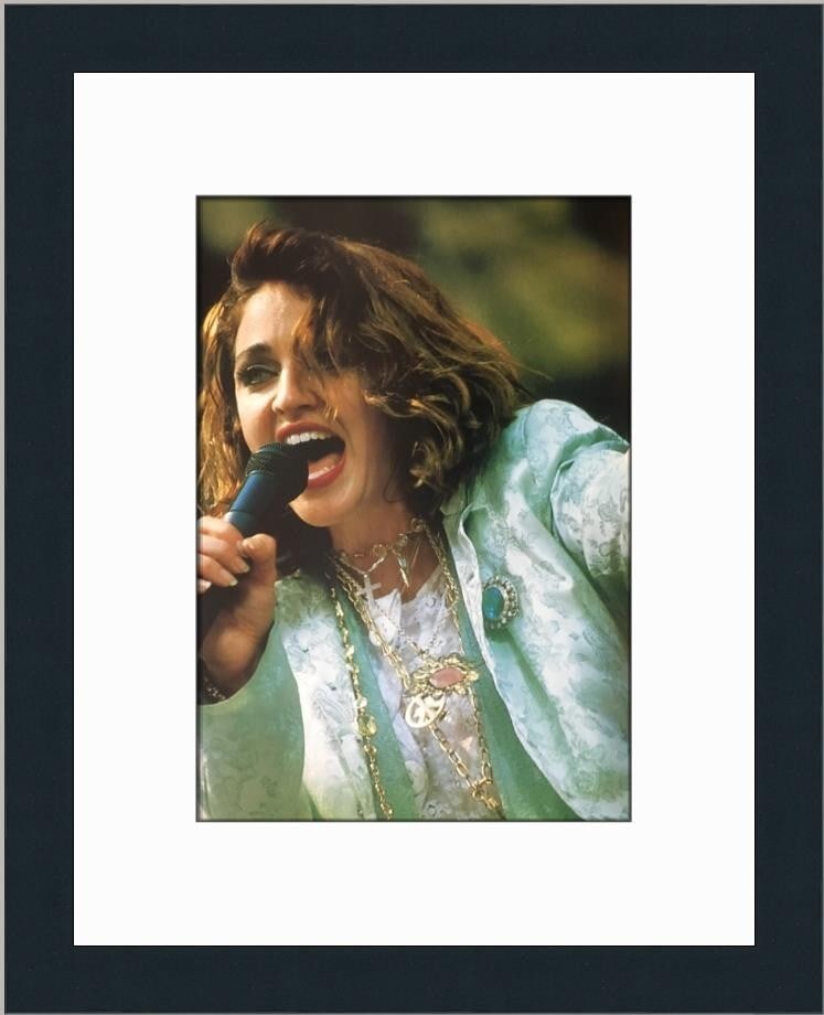 Madonna Live Aid Concert Custom Framed Reproduction Print 18 x 13: Madonna Live Aid Concert Custom Framed Reproduction Print 18 x 13 This stunning reproduction print captures Madonna's iconic performance at the Live Aid Concert. The image measures 12" x 7" and is bea
