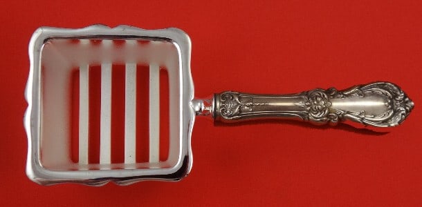 Reed and Barton Burgundy Sterling Silver Corn Butterer Custom Made: Reed and Barton Burgundy Sterling Silver Corn Butterer Custom Made This exquisite corn butterer from the Burgundy pattern by Reed and Barton is a stunning addition to any serving collection. Crafted w