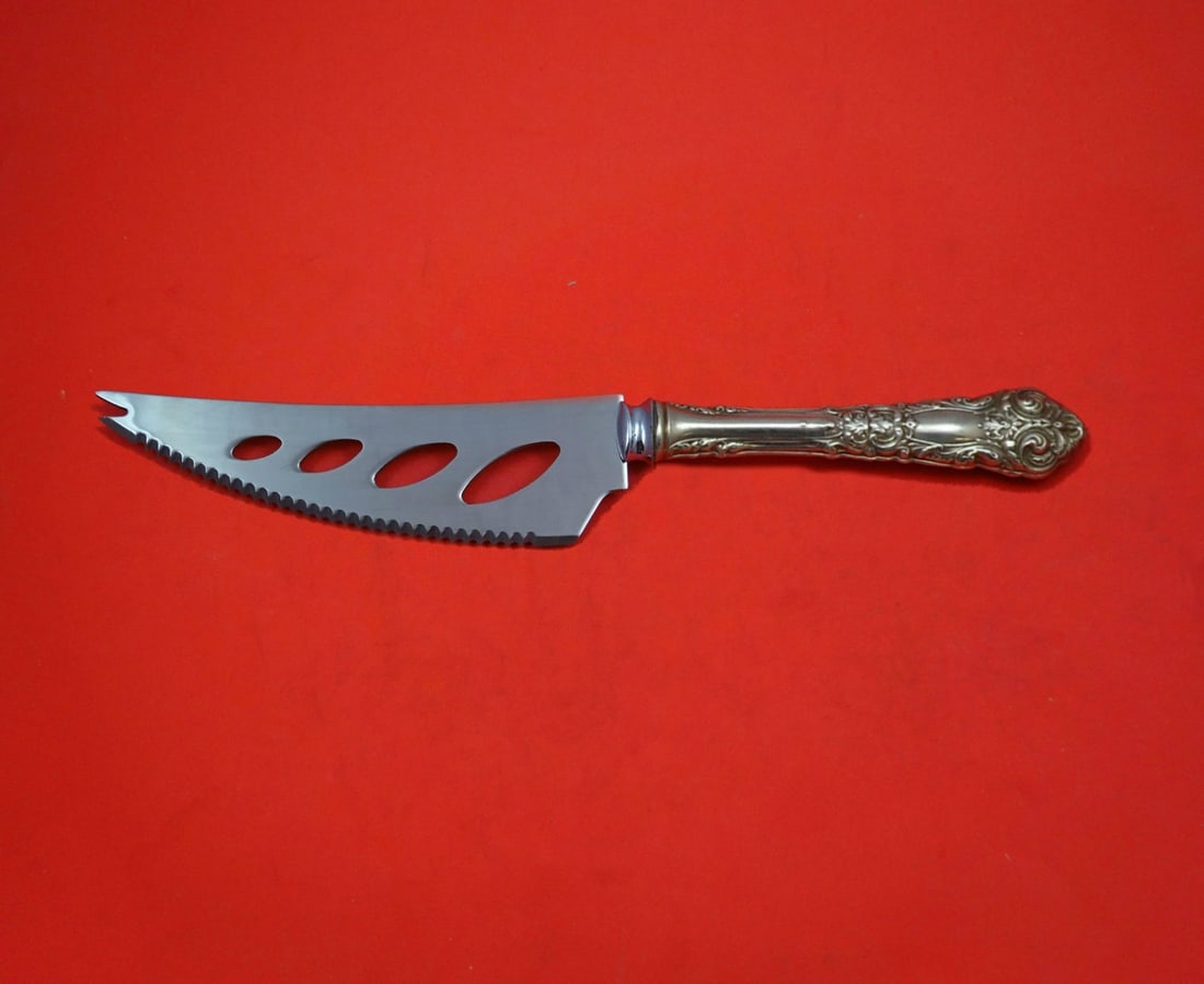 Reed & Barton French Renaissance Sterling Silver Cheese Knife 7 inch: Reed & Barton French Renaissance Sterling Silver Cheese Knife 7 inch This exquisite cheese and sausage knife showcases the elegance of the French Renaissance pattern by Reed & Barton. Crafted with a s
