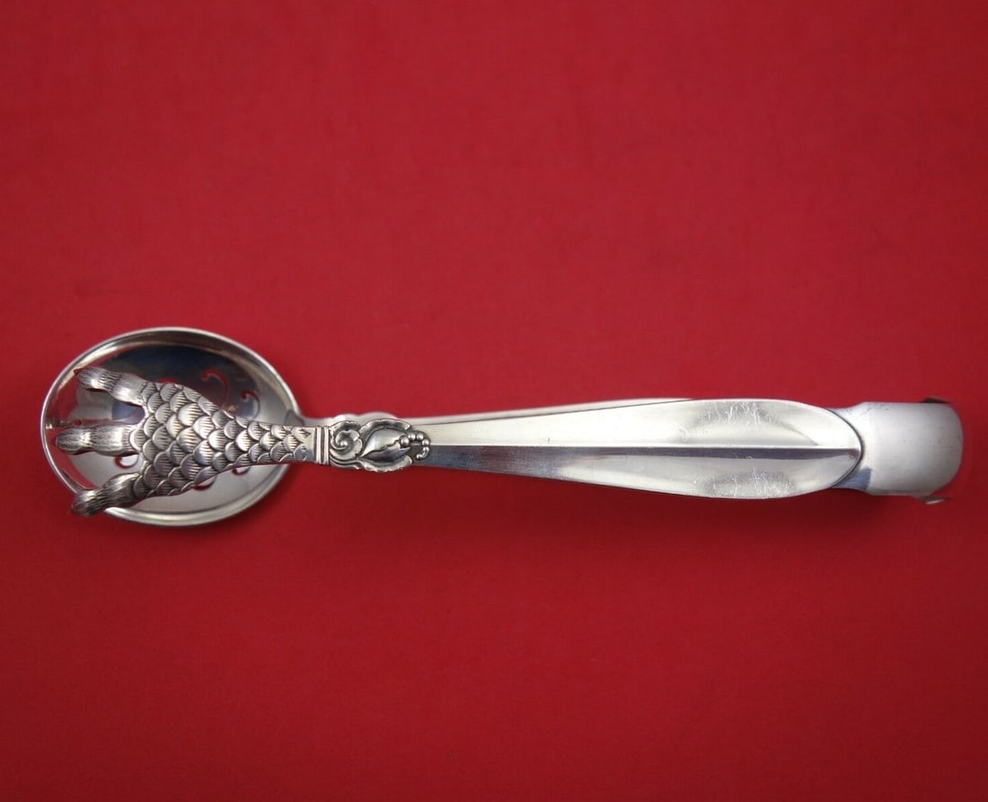 Frigast Princess Fuchsia Sterling Silver Ice Tongs 7 3/8 inches: Frigast Princess Fuchsia Sterling Silver Ice Tongs 7 3/8 inches Discover the exquisite Princess Fuchsia ice tongs crafted by Frigast. These elegant tongs, measuring 7 3/8 inches, are made of high-qual