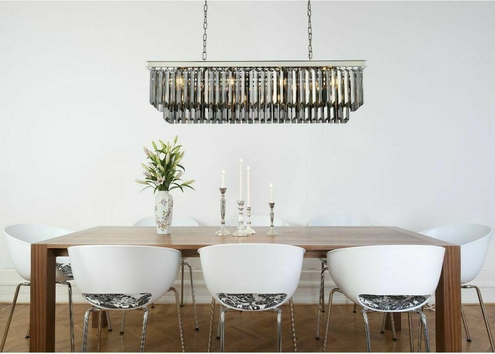 Sydney 12-Light Crystal Chandelier 50 Inch Modern Polished Nickel Rectangle: Sydney 12-Light Crystal Chandelier 50 Inch Modern Polished Nickel Rectangle This modern crystal chandelier features a polished nickel frame with silver shade (grey) royal cut crystals, providing a sop