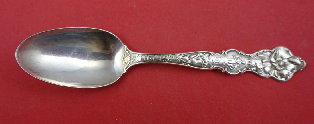 Wallace Sterling Silver Teaspoon Flower of the Month August Poppy 5 7/8": Wallace Sterling Silver Teaspoon Flower of the Month August Poppy 5 7/8" This exquisite sterling silver teaspoon, designed by Wallace in the post-1940 period, features the beautiful Angelique pattern.