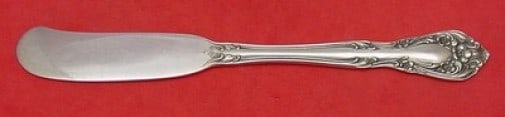 Alvin Chateau Rose Sterling Silver Butter Spreader 5 3/4" Flat Handle: Alvin Chateau Rose Sterling Silver Butter Spreader 5 3/4" Flat Handle This exquisite butter spreader features a flat handle design, crafted from sterling silver and adorned with the elegant Chateau Ro
