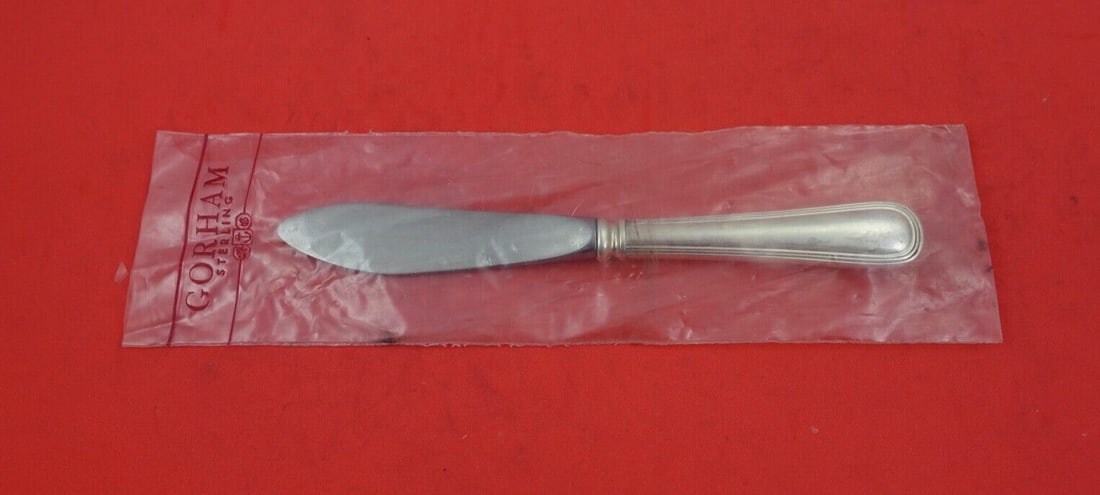 Durgin Bradford Sterling Silver Master Butter Spreader Rare 6 5/8": Durgin Bradford Sterling Silver Master Butter Spreader Rare 6 5/8" Discover a rare piece from the Bradford pattern by Durgin, this Sterling Silver Master Butter Spreader features a hollow handle and m