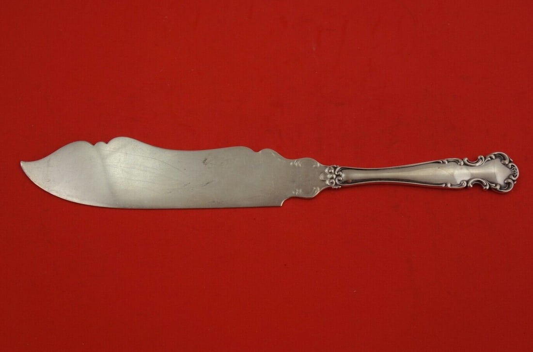 Alvin Simons Flanders Old Sterling Silver Ice Cream Slice 10 1/2": Alvin Simons Flanders Old Sterling Silver Ice Cream Slice 10 1/2" Discover the elegance of the Flanders Old ice cream slice by Alvin - Simons, crafted from premium sterling silver. This exquisite piec