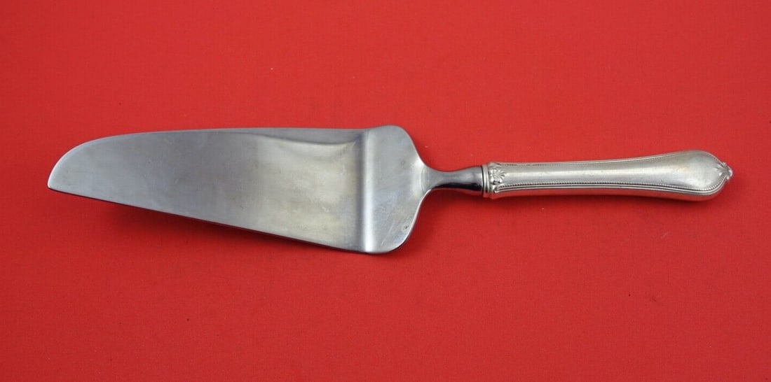 Towle Old Newbury Sterling Silver Pie Server 10 3/4 Inches: Towle Old Newbury Sterling Silver Pie Server 10 3/4 Inches This exquisite pie server is part of the Old Newbury pattern by Towle, crafted from high-quality sterling silver. Measuring 10 3/4 inches, it