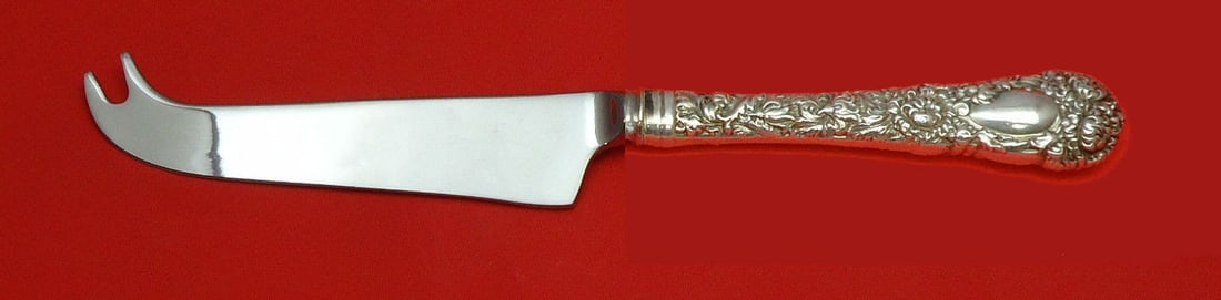 Durgin Chrysanthemum Sterling Silver Cheese Knife Custom Made: Durgin Chrysanthemum Sterling Silver Cheese Knife Custom Made This exquisite cheese knife features the elegant Chrysanthemum pattern by Durgin, crafted from high-quality sterling silver. The knife boa