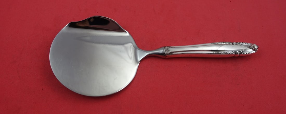 Wallace Stradivari Sterling Silver Tomato Server 8.5 Inch: Wallace Stradivari Sterling Silver Tomato Server 8.5 Inch This exquisite tomato server from the Stradivari pattern by Wallace showcases the timeless elegance of sterling silver. Crafted with a hollow