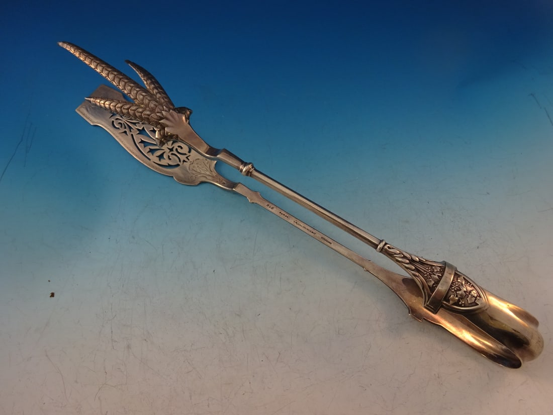 Gorham Ivy Sterling Silver 11.5 Inch Asparagus Tong Brite-Cut: Gorham Ivy Sterling Silver 11.5 Inch Asparagus Tong Brite-Cut Experience the elegance of the Ivy pattern by Gorham with this exceptional large asparagus serving tong. Crafted from sterling silver, thi