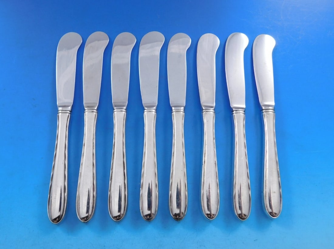 Towle Silver Flutes Sterling Silver Butter Spreader Set of 8: Towle Silver Flutes Sterling Silver Butter Spreader Set of 8 Enhance your dining experience with this elegant set of 8 butter spreaders from Towle, featuring the exquisite Silver Flutes pattern. Each