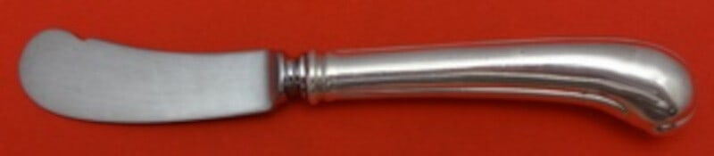 Old Newbury Crafters Newburyport Sterling Silver Butter Spreader 6 1/8": Old Newbury Crafters Newburyport Sterling Silver Butter Spreader 6 1/8" This exquisite butter spreader, crafted by Old Newbury Crafters, showcases a beautiful Sterling Silver design in the Newburyport