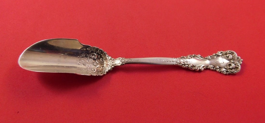 International Sterling Silver Revere Cheese Scoop 6.75 Inch Monogrammed: International Sterling Silver Revere Cheese Scoop 6.75 Inch Monogrammed This exquisite cheese scoop features the classic Revere pattern by International Sterling. Crafted from high-quality sterling si