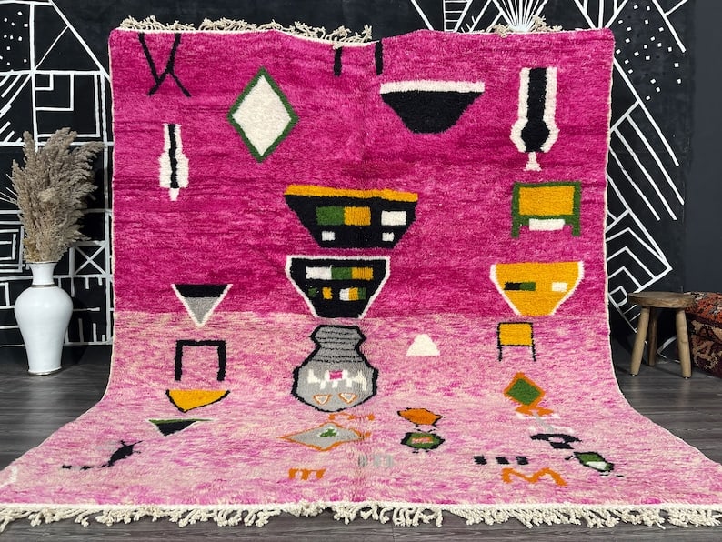 Authentic Handwoven Pink Rug from Morocco 100% Sheep Wool: Authentic Handwoven Pink Rug from Morocco 100% Sheep Wool Experience the elegance of this Luxury Authentic Pink Rug, meticulously handwoven in the Atlas Mountains by skilled local Berber women. Crafte