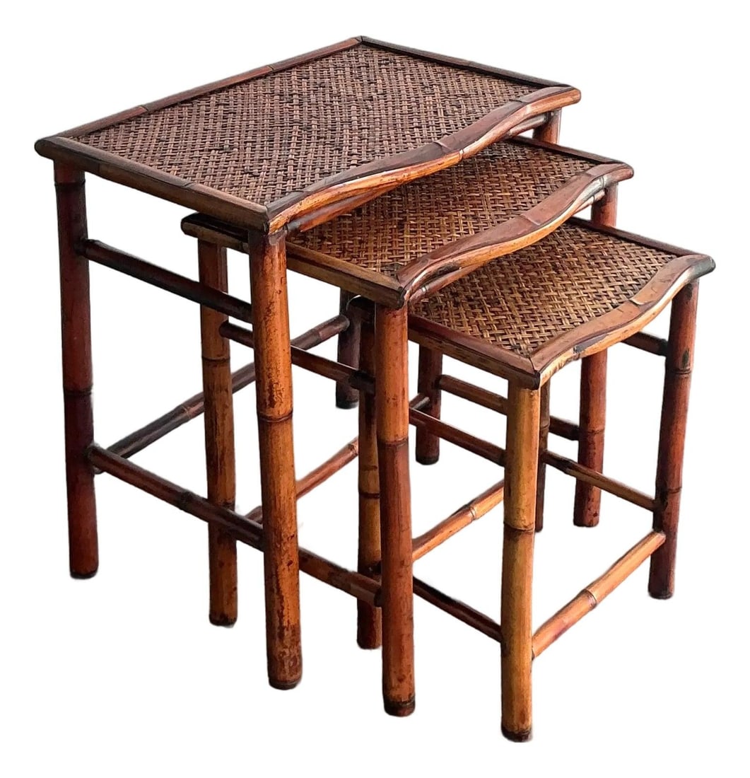 Set of 3 Handwoven Rattan and Bamboo 1970s Bohemian Nesting Tables: Set of 3 Handwoven Rattan and Bamboo 1970s Bohemian Nesting Tables This set of three vintage nesting tables exemplifies 1970s Bohemian and Coastal style, featuring sturdy frames made from natural flam