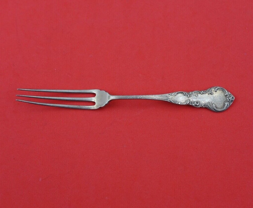 Watson Sterling Silver Strawberry Fork Unknown Pattern 4 3/4": Watson Sterling Silver Strawberry Fork Unknown Pattern 4 3/4" This exquisite strawberry fork is crafted from high-quality sterling silver by Watson. Measuring 4 3/4 inches in length, it showcases a ti