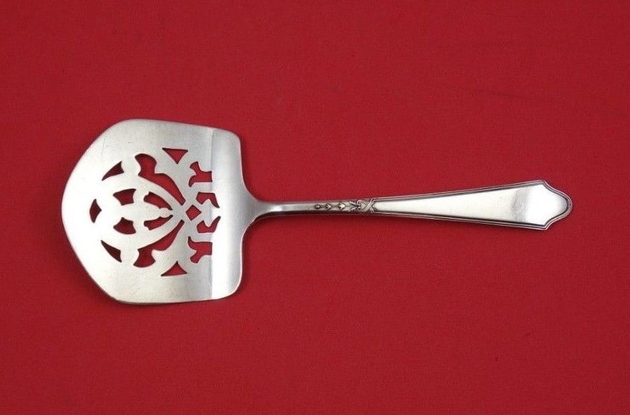 Lunt Chateau Sterling Silver Cucumber Server 6.25 Inch Serving Piece: Lunt Chateau Sterling Silver Cucumber Server 6.25 Inch Serving Piece This exquisite cucumber server from the Chateau pattern by Lunt is crafted from high-quality sterling silver. Measuring 6 1/4 inche