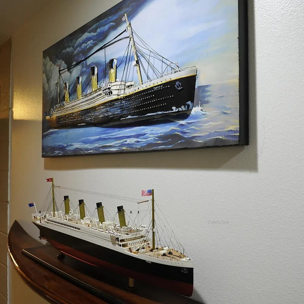 Handmade Metal Titanic 3D Wall Art Nautical Decor 22x47 inches: Handmade Metal Titanic 3D Wall Art Nautical Decor 22x47 inches This stunning handmade metal wall decor features a realistic 3D representation of the Titanic, capturing the essence of nautical artistry