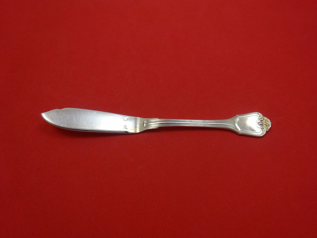 Christofle Port Royal Silverplate Fish Knife Flat Handle 7 3/4": Christofle Port Royal Silverplate Fish Knife Flat Handle 7 3/4" This elegant fish knife features a flat handle design and is crafted from high-quality silverplate. Designed in the Port Royal pattern b