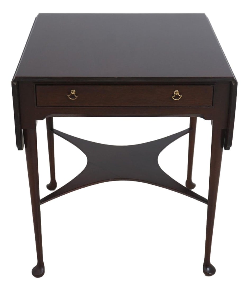 Mahogany Scalloped Drop Leaf Table with Drawer and Brass Hardware: Mahogany Scalloped Drop Leaf Table with Drawer and Brass Hardware This Madison Square occasional table features a traditional 18th-century style with scalloped drop leaves and solid brass hardware. Co