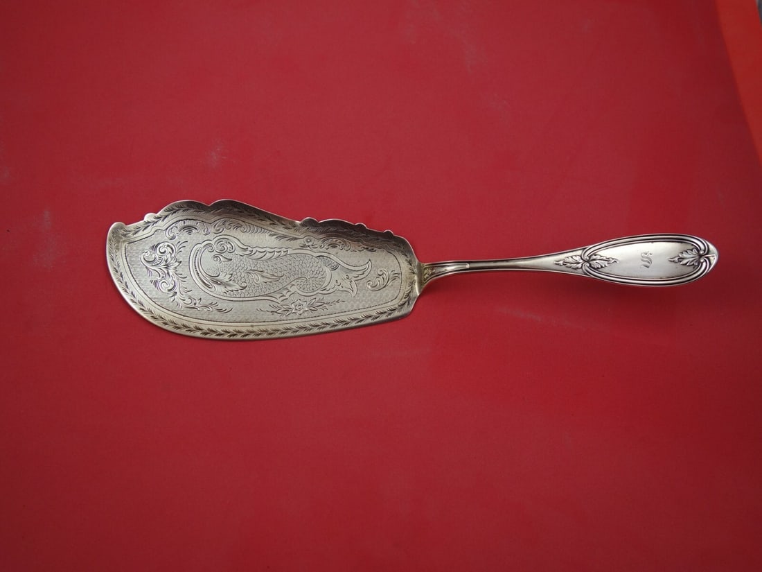 International Sterling Silver Fontaine Fish Server Dolphin 11 3/4 Inch: International Sterling Silver Fontaine Fish Server Dolphin 11 3/4 Inch This exquisite fish server from the Fontaine pattern by International Sterling features a beautifully designed dolphin motif on t