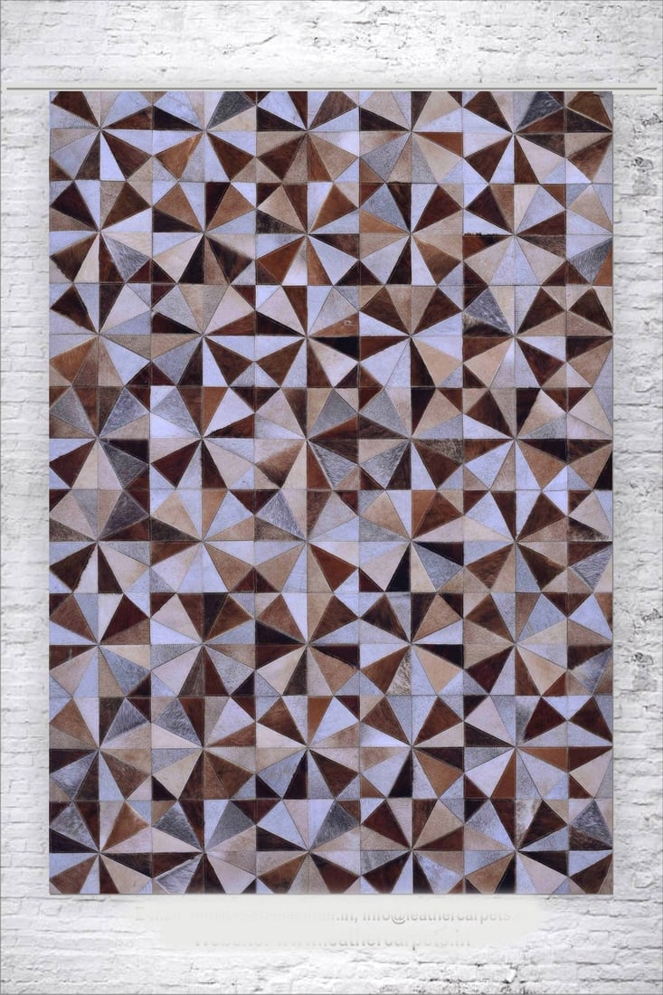 Abstract Geometric Handcrafted Patchwork Cowhide Leather Rug 3FT x 5FT: Abstract Geometric Handcrafted Patchwork Cowhide Leather Rug 3FT x 5FT Free continental US Shipping This elegant rug showcases a handcrafted patchwork of 100% genuine hair-on cowhide leather, arranged