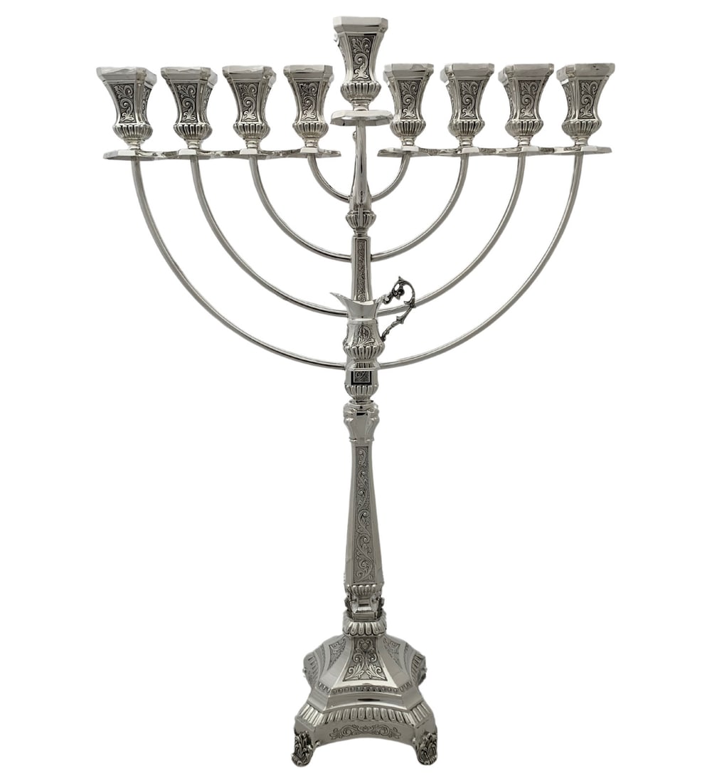 Ornate 925 Sterling Silver Handmade Swirl Leaf Menorah 26.25 Inches: Ornate 925 Sterling Silver Handmade Swirl Leaf Menorah 26.25 Inches This exquisite Menorah is crafted from fine 925 sterling silver, showcasing intricate handmade swirl chased leaf appliques that enha