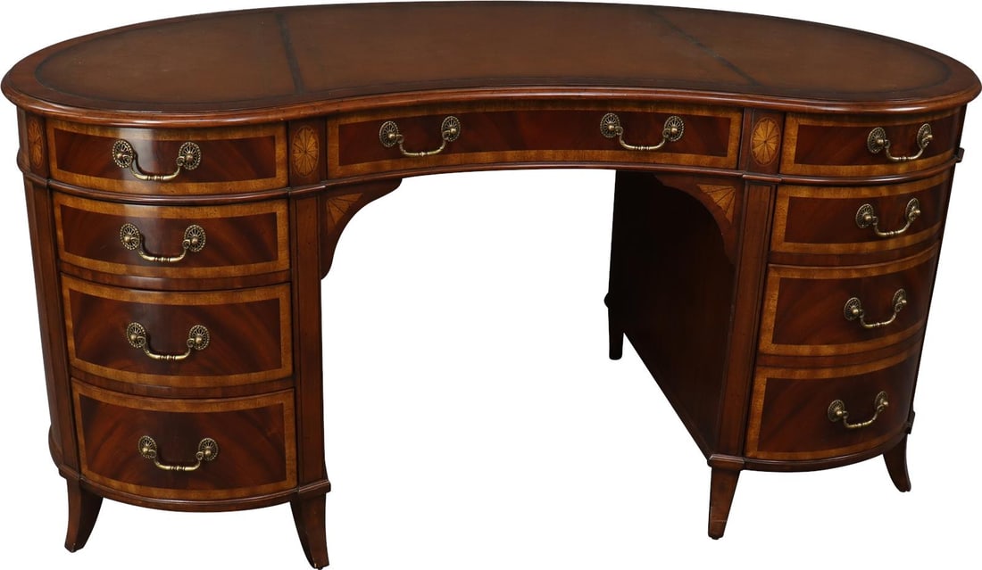 Scarborough House Antique Style Kidney Desk with Brass Handles: Scarborough House Antique Style Kidney Desk with Brass Handles This elegant kidney-shaped desk showcases a beautiful antique style, featuring brass handles and crafted from rich crotch mahogany. Desig