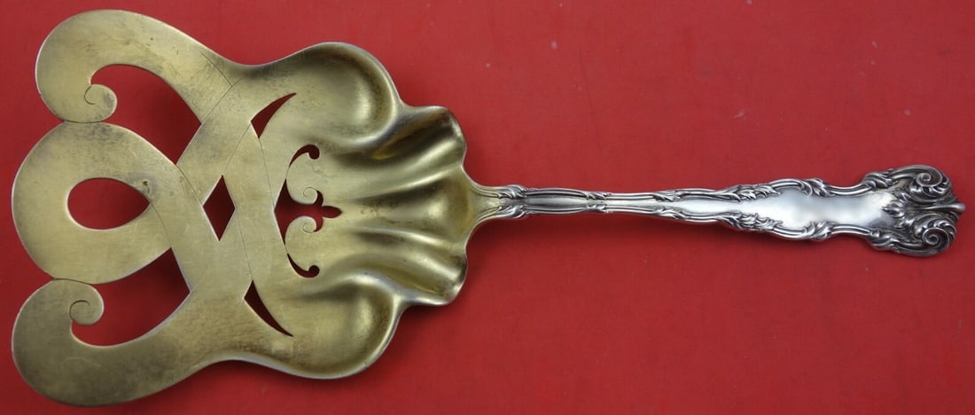 Dominick & Haff Victoria Sterling Silver Asparagus Server Gold Wash 10 1/4": Dominick & Haff Victoria Sterling Silver Asparagus Server Gold Wash 10 1/4" This exquisite asparagus server from the Victoria pattern by Dominick & Haff is crafted from high-quality sterling silver wi