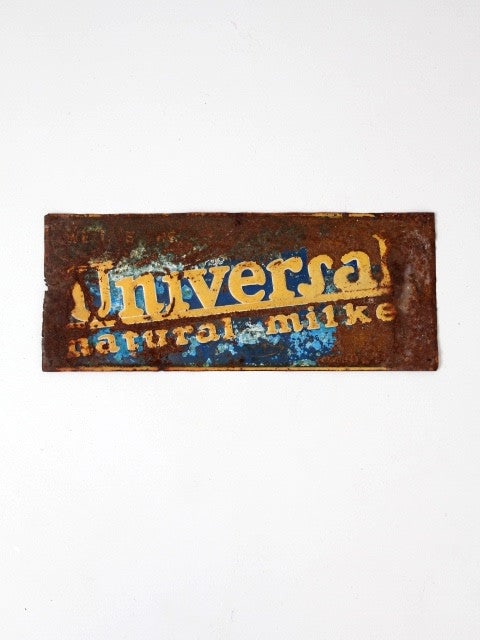 Vintage Universal Natural Milker Embossed Metal Sign 24 x 9.75: Vintage Universal Natural Milker Embossed Metal Sign 24 x 9.75 This vintage Universal Natural Milker metal sign is a charming piece of farm history. Featuring a beautifully embossed company logo, this
