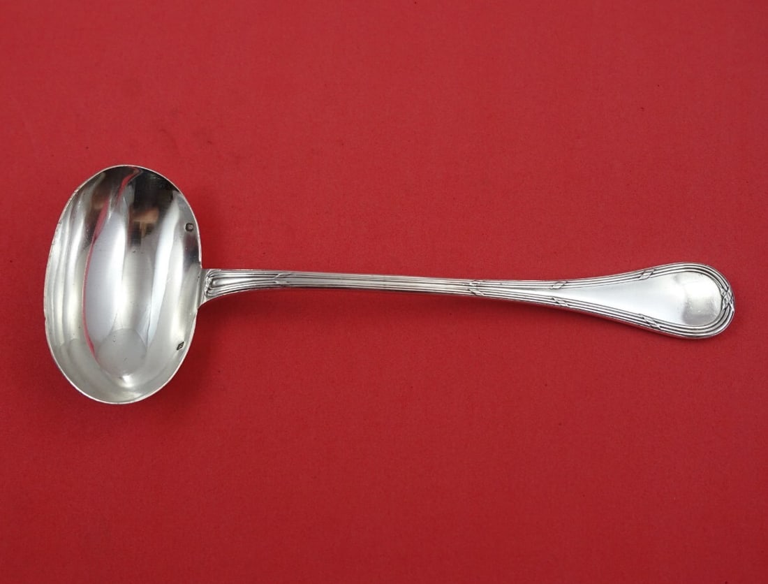 Puiforcat Bougainville Sterling Silver Gravy Ladle 8 Inch: Puiforcat Bougainville Sterling Silver Gravy Ladle 8 Inch Elevate your dining experience with this exquisite 8-inch gravy ladle from the Bougainville pattern by renowned French silversmith Puiforcat.