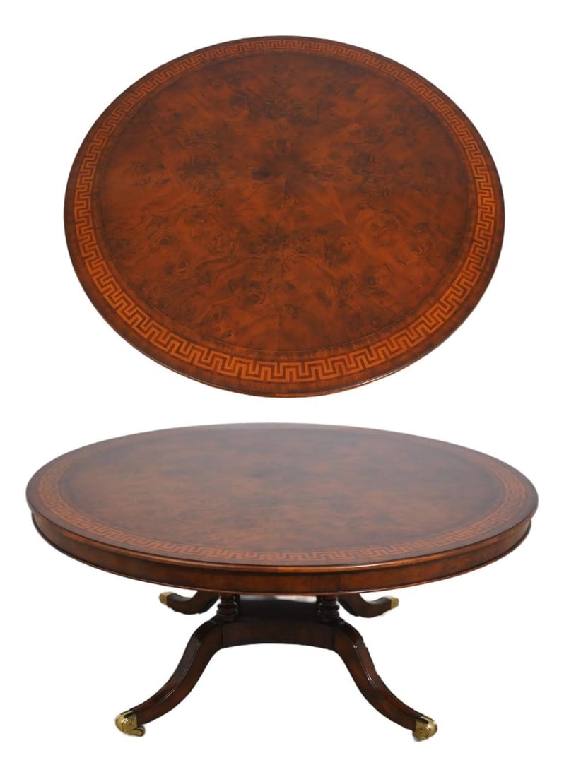 Round Walnut Dining Table with Greek Key Inlay Attributed to Maitland Smith: Round Walnut Dining Table with Greek Key Inlay Attributed to Maitland Smith This round walnut dining room table features a Duncan Phyfe pedestal base with brass-capped feet and a Greek key inlaid bord