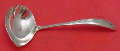 Reed and Barton Petite Fleur Sterling Silver Gravy Ladle 6.5 Inch: Reed and Barton Petite Fleur Sterling Silver Gravy Ladle 6.5 Inch This exquisite gravy ladle from the Petite Fleur pattern by Reed and Barton is crafted from high-quality sterling silver. Measuring 6