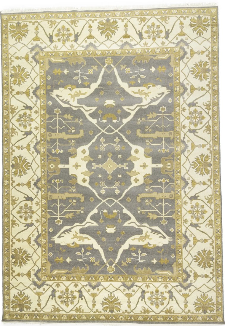 Muted Floral Wool Hand-Knotted Oushak Rug 9'9 x 14' Modern Area Carpet: Muted Floral Wool Hand-Knotted Oushak Rug 9'9 x 14' Modern Area Carpet This handmade Oushak Oriental rug features a muted, distressed floral pattern in tones of taupe, cream, beige, and brown. Expertl